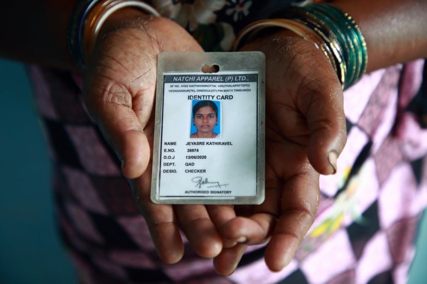 Muthulakshmi shows her daughter’s work identity pass.