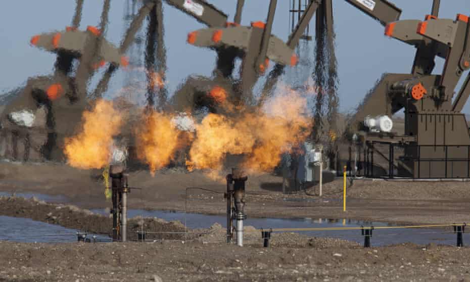 Natural gas is flared off as oil is pumped in the Bakken shale formation in North Dakota.