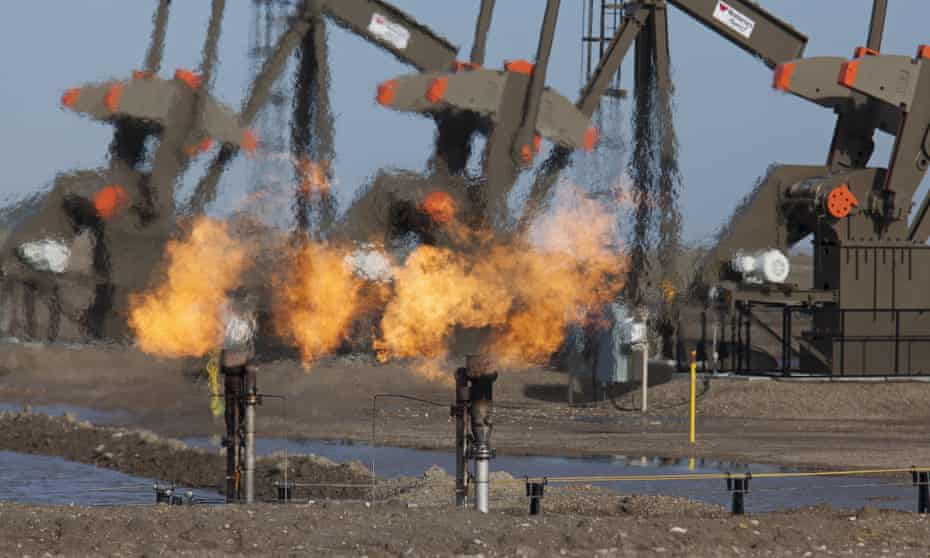 Natural gas is flared off as oil is pumped in the Bakken shale formation, North Dakota, US