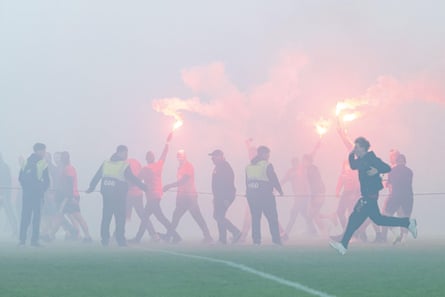 Fans invade the pitch just before the end of Slavia v Sparta
