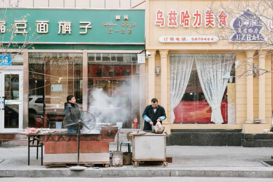Restaurant owners grilling fresh mutton kebabs in China