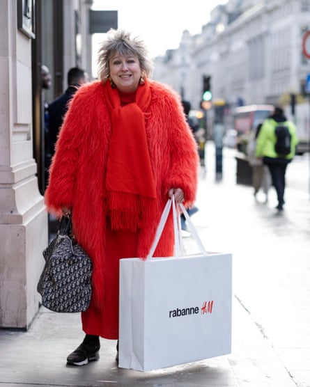 Andrea Cutts holding a large Rabanne H&M bag