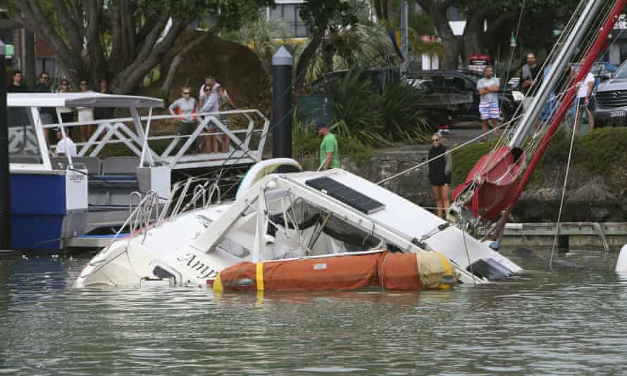 A damaged boat at Tutukaka, New Zealand, after tsunami waves from the Tongan volcano eruption swept into the marina.