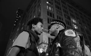 Contemporary issues, third prize, singles - John J Kim March against police violence: Lamon Reccord stares down a police sergeant during a protest following the fatal shooting of Laquan McDonald by police in Chicago, Illinois, US