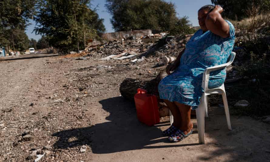 One of the neighbours who joins her friend Manuela to spend the day sitting in a chair watching the day go by.