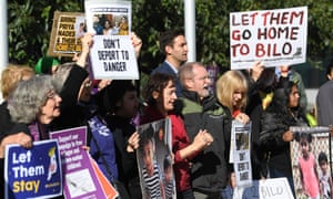 Refugee support advocates gather ahead of a hearing at the federal court in Melbourne