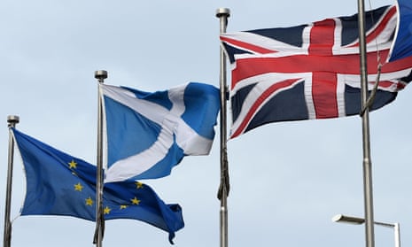 A Scottish saltire, a union flag and an EU flag.