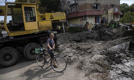 A damaged street is seen after Russian missiles hit residential areas in Sloviansk city, Donetsk Oblast, Ukraine on August 15, 2022. (Photo by Metin Aktas/Anadolu Agency via Getty Images)