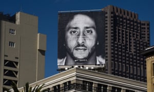 Large Nike poster of Colin Kaepernick on a rooftop