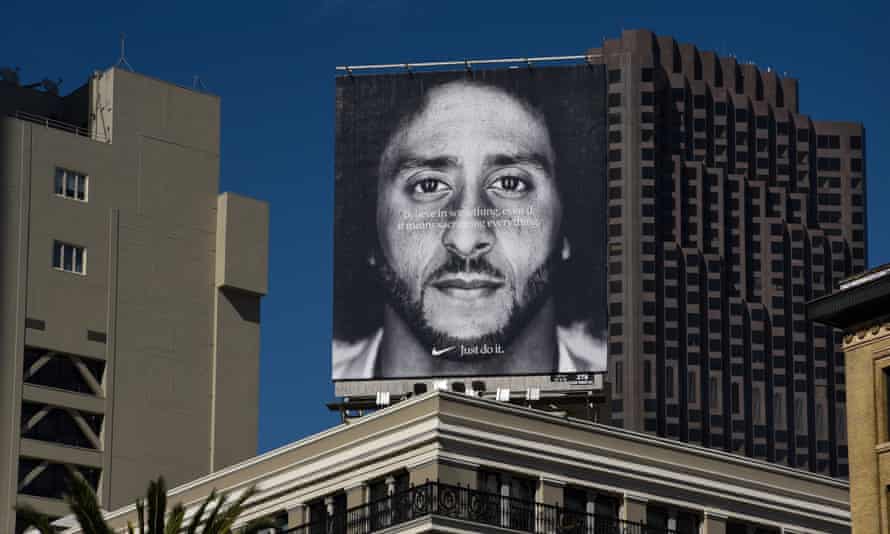 Large Nike poster of Colin Kaepernick on a rooftop