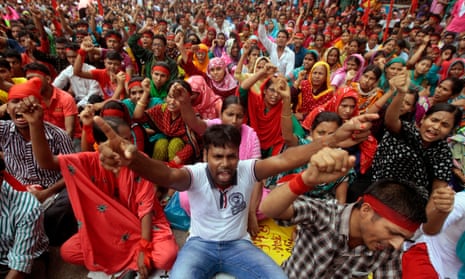 A protest in Dhaka in 2013 demanding a minimum wage and compensation for the victims and those injured in the collapse of the Rana Plaza building. 
