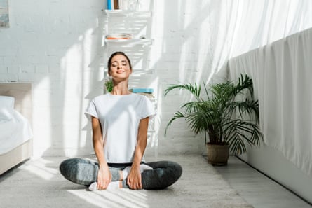 Get to know your cycle and you’ll know when a yoga day is most beneficial (posed by model).