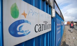 A defaced Carillion sign outside Royal Liverpool hospital.