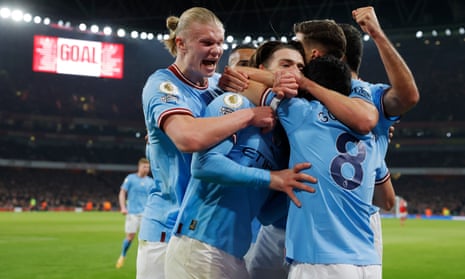 Jack Grealish is congratulated by his teammates - including Erling Haaland (left) as they celebrate after Grealish scored to put Manchester City 2-1 ahead.