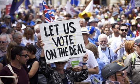 A demonstrator holds a banner during a London march calling for a second referendum on the final Brexit deal.