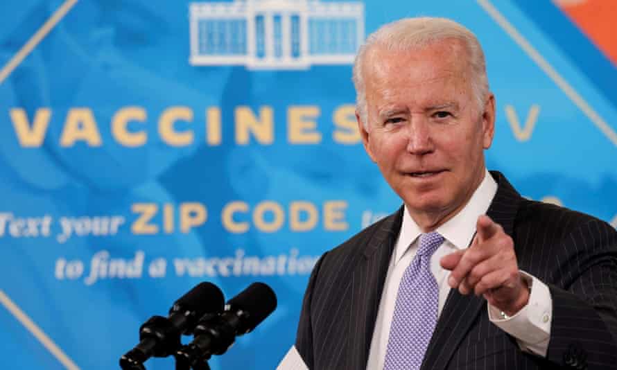 President Joe Biden points at the camera as he speaks on the Covid vaccine.