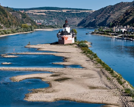 The Zollburg Pfalzgrafenstein toll castle is seen in the middle of the Rhine river with low water levels, in Kaub, Germany, on Monday.