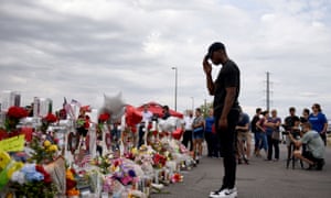 Anthony Emanuel salutes to victims of the El Paso shooting at a memorial in El Paso, Texas, 6 August 2019.