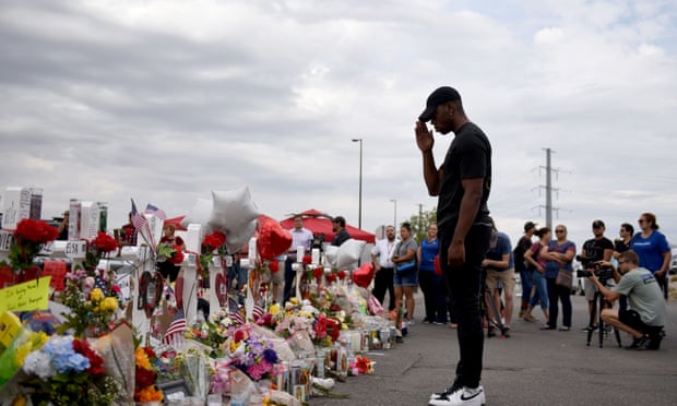 Anthony Emanuel salutes to victims of the El Paso shooting at a memorial in El Paso, Texas, 6 August 2019.