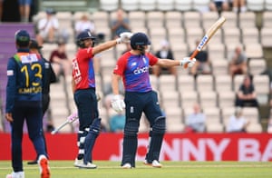Jonny Bairstow and Dawid Malan of England celebrate their fifty years old.