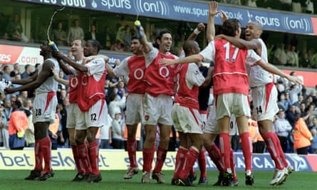 Arsenal’s players celebrate winning the title at White Hart Lane in 2004