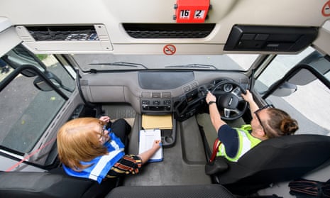 Jo Markham, transport Manager for the logistics company Wincanton takes HGV1 driver Gabi Stefan through a refresher course in vehicle checks and yard positioning at their Portbury depot near Bristol.