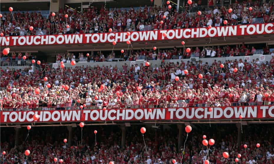 Nebraska fans release red balloons after a touchdown against Troy during the first half of an NCAA college football game in 2018.