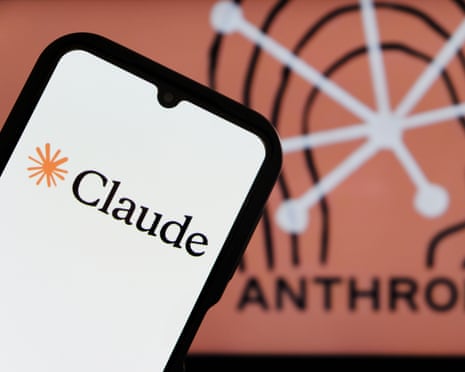 Claude AI logo on smartphone with Anthropic logo in background