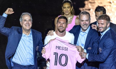 Miami’s owners, including David Beckham and Jorge Mas, celebrate the signing of Messi.