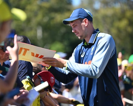 Cameron Green signs autographs during a Cricket Australia fan day in Melbourne