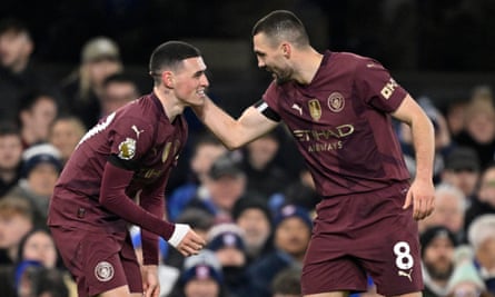 Mateo Kovacic congratulates Phil Foden on his return to form.
