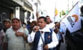 Protesters demand the resignation of Guatemalan President Jimmy Morales, Guatemala City - 28 Aug 2017<br>Mandatory Credit: Photo by Esteban Biba/EPA-EFE/REX/Shutterstock (9028847b) A group of peasants protest to demand the resignation of Guatemalan President Jimmy Morales and to express their support for the International Commission Against Impunity in Guatemala (CICIG) and its holder, Colombian lawyer Ivan Velasquez, declared a “persona non grata” by the president, in Guatemala City, Guatemala, 28 August 2017. Half a thousand members of the Committee of Peasant Development (Codeca) arrived from the interior of the country waving white flags in front of the seat of the Constitutional Court (CC), the highest legal body which maintains the suspension of the expulsion of Velasquez. Protesters demand the resignation of Guatemalan President Jimmy Morales, Guatemala City - 28 Aug 2017