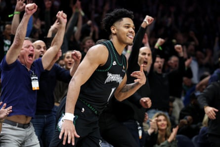 Terrence Shannon Jr celebrates after making a shot during a Timberwolves playoff game.