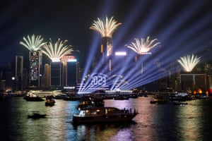 Fireworks explode over Victoria Harbour to mark the New Year in Hong Kong