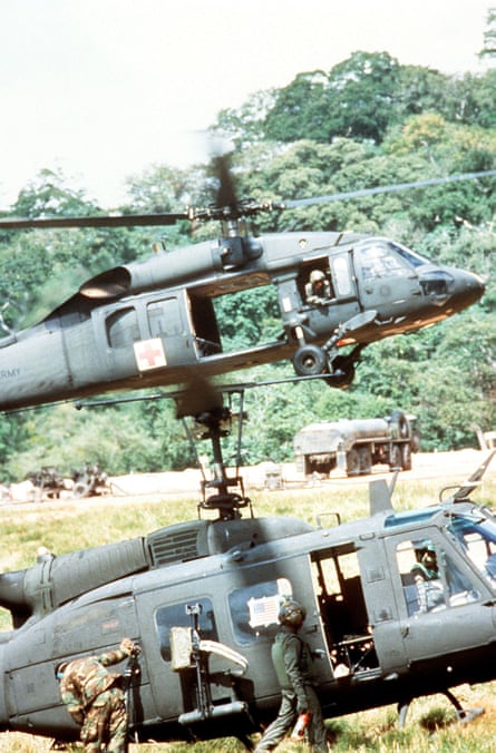 two military helicopters