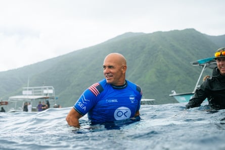 Kelly Slater in the water at Teahupo’o