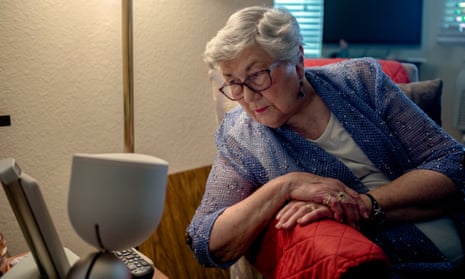Juanita Erickson, 93, and ElliQ, her robot companion, in her studio apartment in Carlton Senior Living in the San Francisco Bay Area.