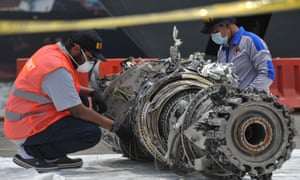 Investigators check debris of the Lion Air plane that crashed off Jakarta on 29 October.