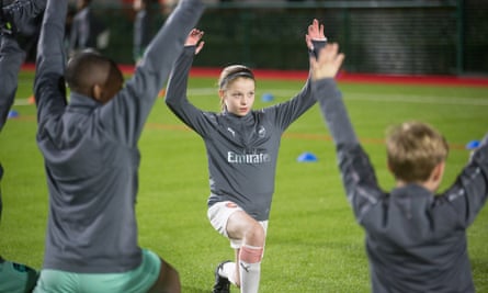 Girls and boys train at the Arsenal academy