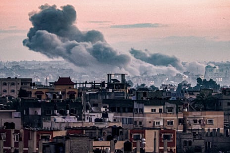 Smoke billows during Israeli bombardment on Khan Younis as seen from Rafah on 3 January.