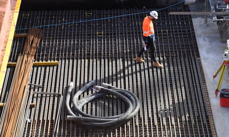 A construction worker is seen on a construction site 