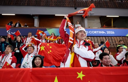 Chinese fans show their support during the wheelchair curling mixed doubles
