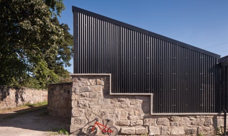 The old garage’s new black ‘corrugated iron’ profile roof is from cladco.co.uk.