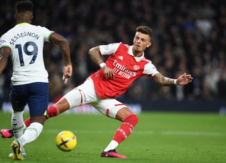 Ben White tackles Ryan Sessegnon during the North London derby.
