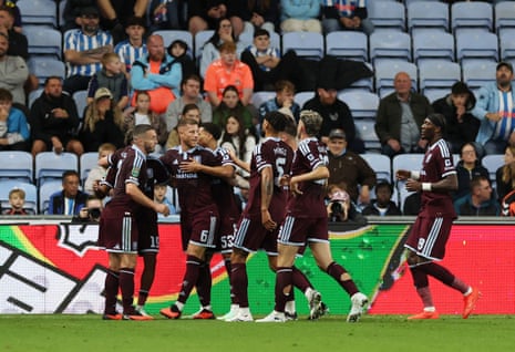 Aston Villa's Ross Barkley (second left) celebrates scoring their second goal with teammates.