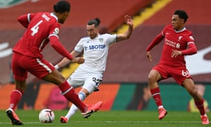 Leeds United’s Jack Harrison fires a shot past Liverpool’s Dutch defender Virgil van Dijk (left) and Trent Alexander-Arnold for their equaliser.