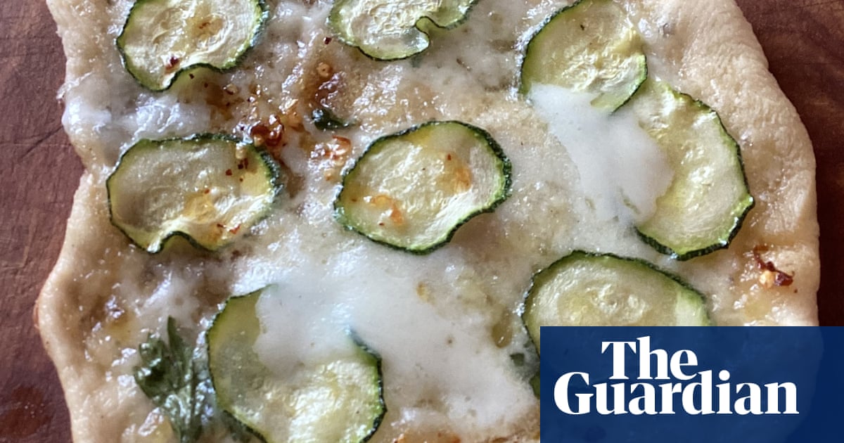 Rachel Roddy’s recipe for pizzette with courgette, mozzarella and mint