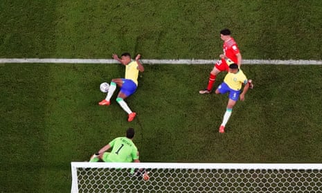 Brazil's Alex Sandro clears the ball before it can reach Switzerland’s Fabian Rieder.