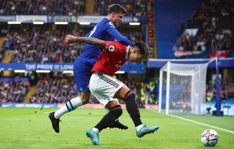 Lisandro Martinez of Manchester United shields the ball from Chelsea’s Mason Mount.