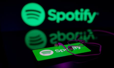 Spotify logo displayed on mobile with Spotify seen on screen in this photo illustration. on 29 January 2023 in Brussels, Belgium.